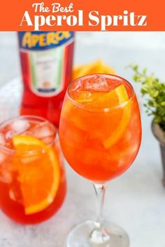 the best apricot spritz is in a glass with an orange slice