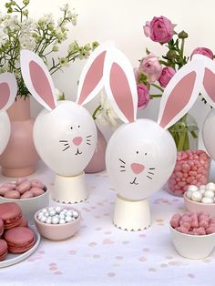 some bunny ears are on the table with other decorations