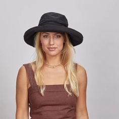 Shield yourself from the sun in style with our Sunny Cotton Sun Hat. Made with premium cotton, this hat features a 1" upturn brim for added protection. Embrace a sophisticated and exclusive look with this must-have accessory. Black Bucket Hat With Upf 50+, Short Brim, Black Bucket Hat With Upf 50+ And Curved Brim, Black Curved Brim Hat With Uv Protection, Black Hat With Uv Protection And Curved Brim, Black Wide Brim Sun Hat With Upf 50+, Black Wide Brim Boater Hat With Upf 50+, Black Hat With Upf 50+ Curved Brim, Black Flat Brim Hat With Uv Protection, Black Wide Brim Bucket Hat