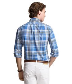 Take your weekend style to higher limits with the Polo Ralph Lauren® Classic Fit Plaid Oxford Shirt. The classic-fit shirt is crafted from a lightweight Oxford woven in a versatile plaid design..Button-down collar..Long sleeves with buttoned cuffs..Signature pony player embroidery at the left chest..Full button-down front closure..Straight back yoke with a center box pleat..Shirttail hemline..100% cotton..Machine wash, tumble dry..Imported..Product measurements were taken using size MD. Please note that measurements may vary by size..Measurements: Length: 29 in Plaid Casual Tops For Business, Plaid Casual Top For Business Casual, Plaid Tops For Business Casual, Classic Plaid Shirt For Casual Gatherings, Business Casual Plaid Cotton Flannel Shirt, Plaid Cotton Flannel Shirt For Business Casual, Casual Business Plaid Flannel Shirt, Casual Plaid Flannel Shirt For Business Casual, Ralph Lauren Casual Shirt For Business Casual