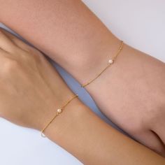 Dainty Tiny Pearl Bracelet, Friendship Bracelet in Gold, Rose Gold, Sterling Silver This dainty bracelet is minimal and elegant. Features a Freshwater pearl wirewrapped onto an Italian bead chain. Materials - Available in: .925 Sterling Silver / Gold Vermeil / Rose Gold Vermeil - Fresh Water Pearl, 3mm (natural pearl sizes vary slightly) - Hypoallergenic, lead, and nickel free Details - Length: 6-7in(15-18cm), 6.75-7.75in(17-19cm) - Handcrafted in NYC To shop more Bracelets: https://www.etsy.com White Adjustable Chain Bracelets For Friendship, Dainty Adjustable Chain Bracelet For Birthday, Dainty Hypoallergenic Bracelets As Birthday Gift, Dainty Hypoallergenic Bracelets For Birthday Gift, White Dainty Bracelet For Birthday Gift, Dainty Hypoallergenic Bracelet For Birthday Gift, Dainty Hypoallergenic Bracelet For Birthday, Delicate Adjustable Hypoallergenic Bracelets, Dainty Adjustable Bracelet For Birthday