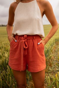 Chic brick-hued shorts that feature an elastic waistband and drawstring closure create a comfortable fit, while the side pockets add convenience. These shorts are perfect for any warm weather outing, keeping you cool and stylish without feeling too revealing. Our models wears the ecru Salman shirt Sizes: S/M/L S: Length 14.2 in - Width 13.4 in M: Length 14.8 in - Width 14.2 in L: Length 15.4 in - Width 15 in 100% Cotton Washing: 86 F European Women, Shorts Outfit, Outfit Trends, Island Girl, Keep Your Cool, Summer Clothes, Women's Summer Fashion, Casual Outfit, Warm Weather