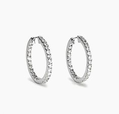 Caption Draft: * ONE OF A KIND ALERT * Join the inner circle and elevate your style with our exclusive Inside Out hoops! 🌟 Seize the chance to shine with 2ctw of pure elegance in 14k white gold. Your insider status awaits, ready to ship in just 2 business days! ﻿Act fast - only one pair in stock, now at link in bio! 💌✨🐎 The Inner Circle, Pure Elegance, Inner Circle