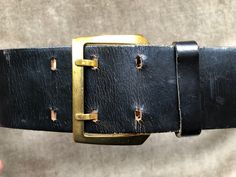 "1940s-60s ladies wide black leather belt cut from semi-thick leather (top grain cowhide). Bronze or brass/gold tone buckle. Marked a size 22. In okay vintage condition; leather seems flexible and strong however there are hairline surface cracks in the black top finish most notable around the holes; please inspect photos; AS IS. Fits approx waist 21.5\"-23.5\" waist. (up to 23.5\" absolute max).  Recommended for 21\"-23\" max. 22\"-22.5\" exact would be ideal. 1 7/8\" wide." Vintage Black Belt Buckles With Brass Detail, Vintage Black Belt Buckles With Brass, Vintage Black Belt With Brass Buckle, Vintage Black Brass Belt Buckles, Vintage Black Belt With Antique Buckle, Vintage Black Belt Buckle With Antique Design, Belt Western, 1950s Retro, Western Rodeo