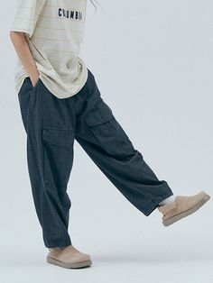 This is a comfortable and casual pants that are made out of high quality cotton 100% fabric. With design detail of comfortable wide balloon silhouette and half elastic waistband, it gives a trendy and refined look.- Half elastic waistband- Scholarly Lion label detail- Wide balloon silhouette- Pin tuck and dart on the hem Ankle-length Cotton Jeans With Side Pockets, Casual Wide-leg Cotton Cargo Jeans, Spring Denim Cargo Pants With Elastic Waistband, Baggy Utility Cargo Jeans With Elastic Waistband, Casual Cotton Pull-on Pants, Casual Baggy Cargo Jeans With Elastic Waistband, Cotton Wide Leg Cargo Jeans For Elevated Casual, Cotton Wide Leg Pants With Pockets For Casual Wear, Elevated Casual Wide Leg Cotton Cargo Jeans