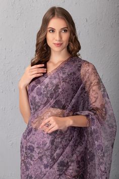 Mauve saree with floral printed motifs. Comes with blouse.
Component: 2
Pattern: Printed
Type Of Work: Floral Print
Neckline: V neck
Sleeve Type: Sleeveless
Fabric: Organza and Raw Silk
Color: Purple
Other Details: 
V neckline
Occasion: Wedding - Aza Fashions Elegant Floral Print Pre-draped Saree For Diwali, Elegant Floral Pre-draped Saree For Diwali, Georgette Pre-draped Saree With Floral Print, Elegant Purple Dupatta With Printed Motifs, Elegant Diwali Blouse Piece With Floral Print, Elegant Festive Blouse Piece With Floral Print, Elegant Floral Print Blouse For Diwali, Elegant Festive Blouse With Floral Print, Festive Elegant Blouse With Floral Print