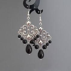 "Length: approx. 68mm (2 5/8\") Width: approx. 30mm (1 1/4\") Made of Tibetan Silver, 925 sterling silver hooks, Czech glass pearls" Black Gem Earrings, Gothic Black Nickel-free Plug Earrings, Nickel-free Gothic Black Plug Earrings, Black Ornate Dangle Jewelry, Handmade Black Gothic Earrings, Ornate Black Dangle Jewelry, Black Gothic Drop Plug Earrings, Gothic Black Drop Earrings, Victorian Black Dangle Earrings