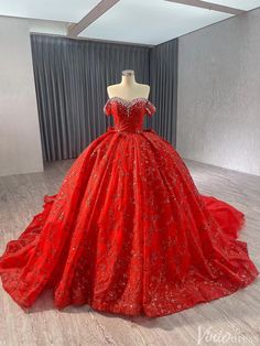 a red ball gown on display in a room