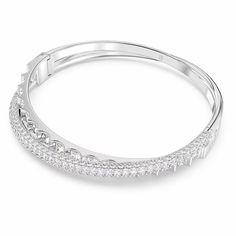 This Swarovski Rota bangle bracelet is dainty and elegant, making it the perfect accessory for any look. Fine Jewelry Bracelets With Brilliant Cut For Evening, Evening Fine Jewelry Bracelets With Brilliant Cut, Luxury Sparkling Bangle Bracelets, Luxury Sparkling Bangle Bracelet, Elegant Round Bangle For Evening, White Gold Bangle Diamond Bracelet For Evening, White Gold Diamond Bangle For Evening, Luxury Sparkling Bracelets For Formal Occasions, Luxury Sparkling Bracelet For Formal Occasions