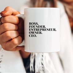 a woman is holding a coffee mug with the words boss, founder, entrepreeur, owner, geo