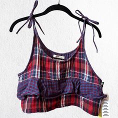 - Size Medium - Condition: New With Tags - Color: Multicolor (Red, Blue, Purple, White) - Little Opening In The Chest Area - Tie Shoulder Straps Summer Plaid Cropped Top, Urban Outfitters Sleeveless Cotton Top, Urban Outfitters Multicolor Cotton Top, Urban Outfitters Plaid Cotton Tops, Urban Outfitters Flannel, White Bustier, Yellow Floral Top, Cutout Crop Top, Flowy Crop Top