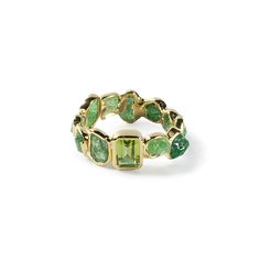 Unlike anything you've encountered, this silver ring is fully plated in 18K gold, showcasing raw Tsavorite (Green Garnet) crystals in an edgy, innovative arrangement by German Kabirski. At its heart lies an octagon-cut 5x7 natural Peridot, anchoring the wild design. This ring dares to be different without being flashy, letting you express your true self with bold authenticity and no unnecessary frills. Metal: 925 Silver Stones: Rough Tsavorite, Peridot Plating: 18K Gold  PLEASE NOTE: This design features raw gemstones, untreated and unpolished. They can exhibit scratches, color zoning, and chips—these are not flaws, but signs of authenticity. Natural gemstones may look different in various light settings; please refer to the model photo for the most accurate representation. Emerald Cut Multi-stone Emerald Jewelry, Green Tsavorite Rings With Gemstone Accents, Green Tourmaline Multi-stone Emerald Ring, Emerald Cut Peridot Gemstone Jewelry, Green Emerald-cut Gemstone Accent Jewelry, Emerald Multi-stone Jewelry For May Birthstone, Emerald Cut Green Gemstone Jewelry, Green Emerald Cut Jewelry With Gemstone Accents, Green Emerald Cut Multi-stone Jewelry