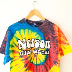 90s rainbow spiral tie dye Nelson, British Columbia graphic tee 100% Cotton Size M Measurements: Length: 27 inches Chest: 38 inches Shoulder to shoulder: 19 inches Sleeve length: 7.5 inches Condition: Gently worn, in good vintage condition Retro Rainbow T-shirt For Summer, Retro Tie-dye Cotton T-shirt, Vintage Tie Dye T-shirt For Summer, Retro Tie-dye Short Sleeve Tops, Retro Tie Dye Short Sleeve Top, Multicolor Hippie T-shirt With Letter Print, Hippie Multicolor Letter Print T-shirt, Groovy Multicolor Crew Neck T-shirt, Hippie Multicolor Screen Print T-shirt