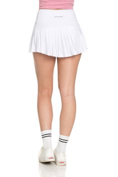 NEW 2.0 Off-White Pleated Tennis Skirt is back and BETTER than ever. Now offering more sizes and sizing accuracy. Just like the original, it is best everyday piece to add to your wardrobe because of its versatility & functionality. The skirt features built-in spandex shorts that include a comfortable fit and side pockets for storage. This exclusively designed Gold Hinge skirt is made of quick dry material and can take on any activity such as golf, tennis, running and more. NEW & Improved Accurat Sporty Mini Pleated Skirt With Built-in Shorts, Sporty Pleated Mini Skirt With Built-in Shorts, Summer Pleated Elastane Tennis Skirt, Casual Short Pleated Swim Skirt, Stretch Shorts For Spring Cheerleading, Spring Stretch Shorts For Cheerleading, Stretch Cheerleading Shorts For Spring, Solid Stretch Short Pleated Skirt, Sporty Stretch Pleated Mini Skirt