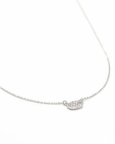 Loved for a chic pendant with subtle personality, the Marisa Necklace in 14k White Gold features Pave Diamonds that sparkle at every angle. Whether you layer on another style or wear it alone, there is nothing you can't wear with this timeless Diamond necklace. Our diamonds are conflict-free in compliance with the Kimberley Process. White Diamond Necklace, Bar Jewelry, Oval Necklace, Necklace White, Fine Jewelry Collection, Diamond Sizes, Oval Diamond, Quality Diamonds, Kendra Scott