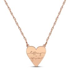 A sweet and romantic way to show your love, this couple's necklace features a 14K rose gold heart customized with both of your names in an elegant script font. The pendant suspends from an 18-inch rope chain thats secures with a spring ring clasp. Rose Gold Engraved Heart Pendant Name Necklace, Engraved Rose Gold Heart Pendant Name Necklace, Rose Gold Heart Pendant Name Necklace, Personalized Rose Gold Heart Necklace For Anniversary, Engraved Rose Gold Heart Necklace For Valentine's Day, Customizable Rose Gold Necklaces For Valentine's Day, Customizable Rose Gold Necklace For Valentine's Day, Personalized Engraved Rose Gold Heart Necklace, Rose Gold Name Necklaces For Valentine's Day