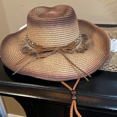 Nwt Western Boho Coastal Cowgirl Wide Brim Cowboy Hat Trimmed With Tassel, Braided And Jeweled Hat Band Wired Brim Making It Reshapable Adjustable Chin Strap Cord Holds The Hat In Place For Windy Days; Interior Adjustable Hat Band Woven Straw Color: Brown Brim 3.5” Hat Size 57 Cm Non-Smoking Home Wild West Boho Coastal Cowgirl Western Chic Bohemian Shabby Chic Beach Summer Sun Hat Brown Casual Straw Hat For Rodeo, Casual Brown Sun Hat For Rodeo, Trendy Brown Straw Hat For Vacation, Trendy Brown Straw Hat For Festivals, Trendy Brown Beach Hat, Brown Straw Hat For Rodeo, Brown Sun Hat For Beach Season And Country Events, Brown Sun Hat For Country Events And Beach Season, Brown Brimmed Beachy Hat