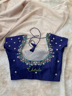 Luxury Blue Blouse With Zari Work, Luxury Blue Blouse For Eid, Luxury Unstitched Blue Blouse Piece, Luxury Blue Blouse With Chikankari Embroidery, Luxury Blue Blouse With Motifs, Luxury Handwork Blue Blouse Piece, Luxury Blue Blouse Piece With Handwork, Luxury Blue Blouse Piece With Embroidered Border, Luxury Semi-stitched Blue Blouse Piece