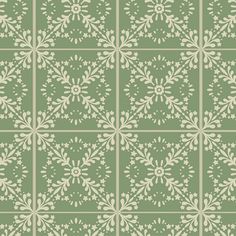 a green and white tile pattern with small flowers on the bottom, in different sizes