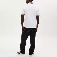 100% cotton Button closure Length - 28 1/4 Model is 6'2 (188cm) and wears a size M Style No. CO817 | Coach Outlet Signature Polo - White, Size - Small Fitted Casual Polo Shirt With Pockets, White Polo Shirt With Button Closure For Work, Urban Cotton Tops With Button Closure, White Button-up Polo Shirt For Work, Classic Cotton Polo Shirt With Pockets, Black Cotton Polo Shirt With Pockets, Casual White Polo Shirt With Pockets, White Cotton Polo Shirt For Streetwear, White Cotton Polo Shirt With Pockets