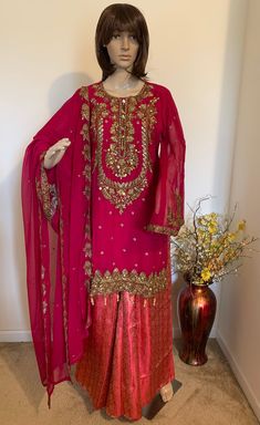 Product code- 105 Work: - Heavy zari work,sequins and stone work    Material: - Chiffon magenta  Colour : - magenta Same As Picture   Sleeve Length: - full Sleeve   Product: - Kurti + Sharara + dupatta  Sharara- Banarsi pink length-39 inch Dupatta- chiffon magenta  Kurti length- 39 Inc   Dupptta: 2.20" mtr.    Size : --40" 42" any size  Stitched: - Yes, full stitched Eid collection 2024  Occasion: - Party/Office/Casual/Travel Wear Elegant Gold Kundan Palazzo Set, Festive Georgette Sharara With Zari Work, Festive Sharara With Zari Work In Georgette, Elegant Shantoon Sharara With Traditional Drape, Elegant Shantoon Sharara For Festive Occasions, Party Sharara With Resham Embroidery In Nida, Georgette Palazzo Set With Dabka Work, Party Sharara In Nida With Resham Embroidery, Georgette Palazzo Set With Dupatta