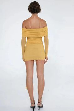 This elegant mini dress features a strapless, off-shoulder design with long sleeves and a bodycon fit. The backless detail adds allure, making it perfect for formal events or special occasions where sophistication meets style. Details: Elasticity: Slight Stretch Fabric Type: Polyester Silhouette: STRAIGHT Neckline: Strapless Material: Polyester Material: SPANDEX Mini Bodycon Dress For Date Night, Mini Length Bandage Dress For Cocktail, Evening Bodycon Bandage Mini Dress, Evening Mini Length Bodycon Bandage Dress, Chic Ruched Off-shoulder Bodycon Dress, Fitted Backless Dress For Spring Dinner, Fitted Off-shoulder Bandage Dress For Evening, Fitted Off Shoulder Long Sleeve Dress For Night Out, Fitted Off-shoulder Long Sleeve Dress For Night Out