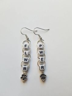 Make a statement and be unique with the super cute beaded earrings! Not buying for yourself? Gift this to a friend! . Shipping info: Your item will be shopped 1-2 days after you place your order with tracking. . Find more in my etsy shop or on my instagram @ sapphire__creations . For custom items, message me on here or Instagram! Trendy Nickel-free Dangle Flower Earrings, Trendy Beaded Flower Earrings For Gifts, Cute Beaded Jewelry, Cute Beaded Earrings, Word Earrings, Beaded Jewelry Earrings, Quirky Earrings, Funky Earrings, Earrings Flower