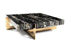 a black and white marble coffee table with gold legs on an isolated white background,