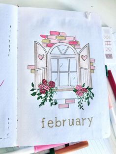 an open notebook with the words february written on it and flowers in front of a window