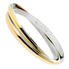 Cartier Interlocking Gold Stainless Bangle 0000069 Cartier Trinity Bracelet, Cartier Bangle, Trinity Bracelet, Cartier Bracelet, Antique Bracelets, Cartier Jewelry, Stainless Steel Bangles, Rose Yellow, Fine Jewelry Bracelets