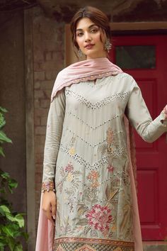 Pakistani Embroidered Dress in Kameez Trouser Style is a Traditional choice to wear on the Festive occasion. This Pakistani Eid Dress is available Online. Eid Traditional Wear With Floral Embroidery On Georgette, Wedding Salwar Kameez With Floral Embroidery And Long Sleeves, Floral Embroidered Long Sleeve Salwar Kameez For Wedding, Wedding Long Sleeve Salwar Kameez With Floral Embroidery, Long Sleeve Salwar Kameez With Floral Embroidery For Reception, Semi-stitched Dresses With Intricate Embroidery For Festive Occasions, Elegant Semi-stitched Lawn Suit With Floral Embroidery, Semi-stitched Festive Dresses With Intricate Embroidery, Floral Embroidered Long Sleeve Salwar Kameez For Reception