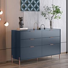 a blue dresser with two faucets and a vase on top in a room