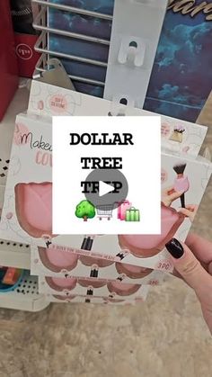 a person holding up a dollar tree card