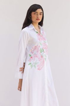 White full cuff sleeves collared maxi shirt dress with Primrose bunch hand painted detailing. - Aza Fashions White Long Sleeve Dress With Cuffed Sleeves, White Dress With Cuffed Sleeves, Feminine Long Sleeve Cotton Shirt Dress, White Collared Neckline Shirt Dress For Spring, White Collared Shirt Dress For Spring, Embroidered Long Sleeve Shirt Dress For Spring, Long Sleeve Floral Embroidery Shirt Dress For Spring, Long Sleeve Shirt Dress With Floral Embroidery For Spring, Elegant Floral Embroidered Shirt Dress For Spring