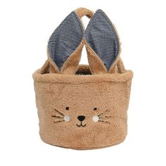 a small basket with a cat face on the front and two ears at the top