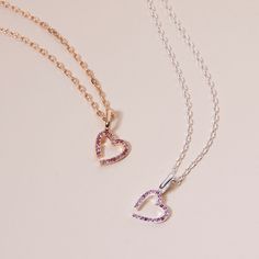 Our new Pink October M Charm Necklace is the Merci Maman Heart, in a new limited edition Pink Crystal for Pink October. This re-designed classic will add a pop of pink sparkle to all your Merci Maman jewelry.18K Champagne Gold Plated or 925 Sterling SilverPink October M Charm: 0.4x0.3 Charms are removable from this chain and can be worn on all Merci Maman chain lengthsSent with love in a complimentary gift box Pink Birthstone Heart Pendant Necklace, Pink Heart Pendant Necklace With Birthstone, Pink Sterling Silver Open Heart Necklace, Pink Heart Cut Birthstone Necklace, Pink Double Heart Sterling Silver Necklace, Pink Sterling Silver Double Heart Necklace, Pink Heart Necklace For Gift, Pink Sterling Silver Heart Cut Necklace, Pink Heart Cut Necklaces, Perfect Gift For Her