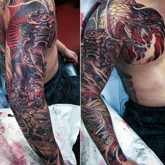 a man with a dragon tattoo on his arm next to another person's stomach