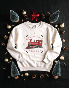 Discover the season's top trending Christmas sweatshirts, from classic designs to funny and merry options. Whether you prefer a Christmas tree, a cozy white style, or a festive message, these popular sweatshirts are perfect for spreading holiday cheer. Shop now to find your perfect fit for the holidays! White Long Sleeve Holiday Sweatshirt, Christmas Cotton Crew Neck Sweatshirt, White Cotton Christmas Sweatshirt, Holiday White Crew Neck Sweatshirt, White Holiday Crew Neck Sweatshirt, White Letter Print Sweatshirt For Holidays, White Crew Neck Sweatshirt For The Holidays, White Crew Neck Holiday Sweatshirt, White Crew Neck Sweatshirt For Holiday