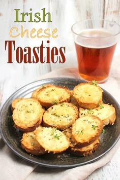 a plate full of toasties next to a cup of tea