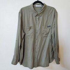 Nwt Calvin Klein Lightweight Button Up Utility Shirt. Roll Tab Long Sleeves. Neutral Army Green. Silver Tone Hardware. Open Chest Pockets. Longer Length. Size 1x Measures: 25" Armpit To Armpit, 29" Length. Casual Calvin Klein Collared Shirt, Calvin Klein Long Sleeve Shirt With Button Closure, Calvin Klein Spring Shirt With Button Closure, Calvin Klein Summer Button-up Top, Casual Long Sleeve Calvin Klein Blouse, Casual Long Sleeve Calvin Klein Shirt, Calvin Klein Long Sleeve Tops With Button Closure, Calvin Klein Spring Button-up Shirt, Casual Calvin Klein Button-up Shirt