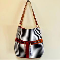 Brand New! Nautical, Natural Themed Bag Black & White Striped Purse With Camel Trim And Gold Hardware 2 Outside Zipper Pockets 1 Inside Zip Pocket 2 Inside Slip Pockets Zipper Closure Both Long And Short Straps Included! Appx. Measurements: Height: 13.5" Width: 15" Depth: 5.5" Brown Travel Bag With Striped Lining, Travel Shoulder Bag With Striped Lining, Chic Travel Bag With Striped Lining, Chic Shoulder Bag With Striped Lining, Chic Shoulder Bag With Striped Lining For Everyday, Double Handle Bag With Striped Lining, Chic Rectangular Shoulder Bag With Striped Lining, Everyday Bags With Striped Lining, Everyday Use Shoulder Bag With Striped Lining