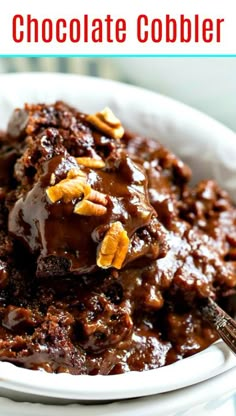 chocolate cobbler in a white bowl with spoons and text overlay that reads, chocolate cobbler