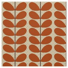 an orange and white wallpaper with leaves on the bottom half of it, against a beige background