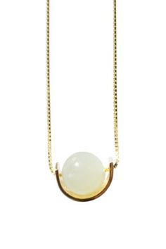 The Equinox necklace features a gold-plated S925 silver box chain and a delicate nephrite bead. Natural nephrite. Made by handwork of carving and polishing. Weight: 3g Chain: Gold-plated S925 sterling silver, fixed length 395mm Pendant: Nephrite diameter 8mm, metal diameter 10mm x thickness 3.5mm Jade Amulet Necklace With Round Pendant, Spiritual Jade Round Pendant Necklace, Adjustable Gold Chalcedony Jewelry, Gold Chalcedony Jewelry As A Gift, Elegant Jade Necklace With Adjustable Chain, Yellow Gold Chalcedony Gemstone Necklace, Jade Gemstone Round Pendant Necklace, Gold Jade Amulet Necklace, Jade Gemstone Beads Necklace For Gift