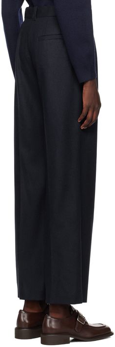 Wool-blend flannel trousers. · High-rise · Belt loops · Three-pocket styling · Zip-fly · Pleats at front · Creased legs · Faux-horn hardware Supplier color: Heather navy blue Fall Business Wide Leg Pants With Pockets, Formal Bottoms With Pockets For Fall, Formal Fall Bottoms With Pockets, Formal Fall Pants With Side Pockets, Wool Bottoms With Pockets For Business Casual, Business Bottoms For Fall With Straight Hem, Wool Pants With Straight Hem And Pockets, Wool Pants With Pockets Straight Hem, Wool Pants With Pockets And Straight Hem