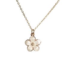 The Magnolia Bloom Necklace encapsulates nature's delicate beauty. Each petal is adorned with a shimmering white enamel, evoking dew-kissed morning blooms. The pendant hangs from an adjustable chain, allowing for personalized length and style. This necklace embodies the magnolia's symbolism of purity, femininity, and endurance. Whether worn as a statement piece or a cherished gift, it brings a touch of timeless elegance to any ensemble. The necklace is perfect for any occasion and would make a g White Petal-shaped Jewelry With Flower Charm, White Flower Necklace With Nature-inspired Style, Elegant White Flower Necklace With Birth Flower Detail, Elegant White Pressed Flower Necklace, Elegant White Flower Necklace For Birth Month, Elegant White Flower Necklace For Birthdays, Elegant White Birth Flower Necklace, White Flower-shaped Nature-inspired Necklace, Nature-inspired White Flower Jewelry