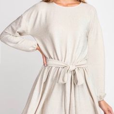 Short Long Sleeve Tie Around The Waist Dress Long Sleeve Shimmer Dress For Date Night, Chic Long Sleeve Mini Dress With Shimmer, Chic Long Sleeve Shimmer Mini Dress, Long Sleeve Shimmer Dress For Spring, Spring Shimmer Dress For Date Night, Shimmer Dresses For Spring Date Night, Spring Long Sleeve Glitter Mini Dress, Chic Shimmer Dresses For Fall, Chic Mini Length Shimmer Dresses