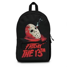 "Friday the 13th Backpack. Features the mask of Jason Voorhees with a knife stabbed in it. Perfect for every day use or your next trip to Halloween Horror Nights at Universal Studios Theme Park! Got snacks? With our roomy and durable backpack, you will be able to bring them all! This bag is made from spun polyester and weights 1.3 lbs - just enough to be light, strong and long-lasting. Grab it, stow it, throw it onto the seat next to you, this backpack can take it, and so will you, wherever you Halloween Themed Travel Backpack, Themed Backpack For Everyday Use And Halloween, Themed Halloween Travel Backpack, Black Standard Backpack For Halloween, Themed Black Backpack For Everyday Use, Black Halloween Standard Backpack, Black Backpack For Halloween Travel, Black Backpack For Halloween, Novelty Black Backpack For Everyday Use