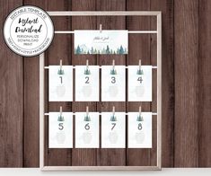 the wedding table plan is displayed on a wooden wall with a sign that says it's winter