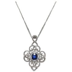 This beautiful pendant features a good luster Blue Sapphire in the centre which weighs 1.22 Carat, accompanied by 0.91 Carat of diamonds set in 18K White Gold. *Chain not included